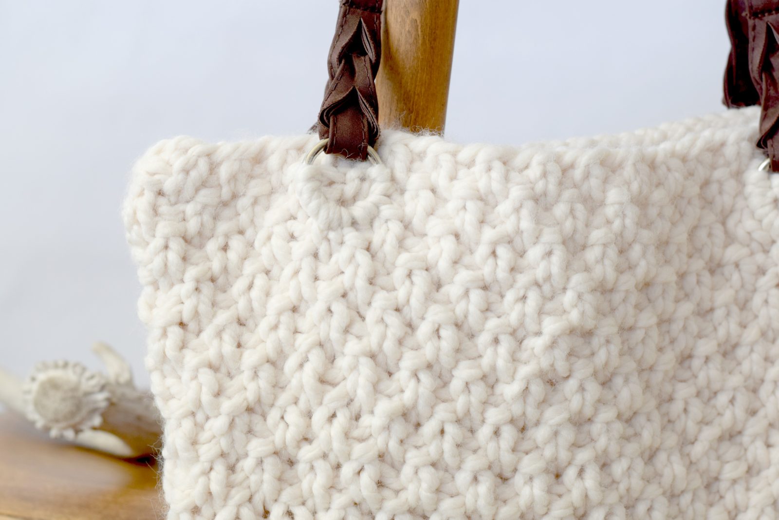 Knit a small bag with our free knitting pattern